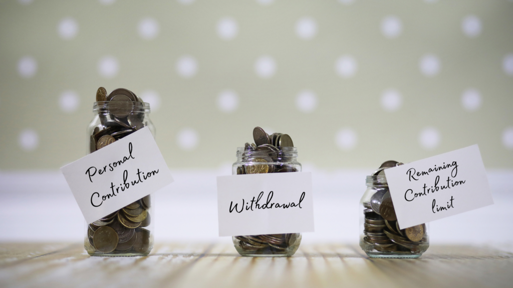 3 jars of coins with labels on them.