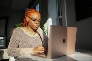 woman looking at a laptop
